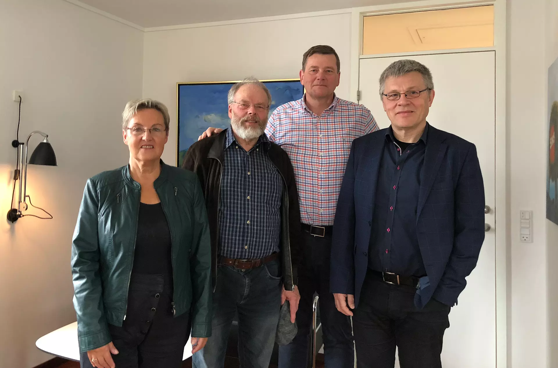 Á myndini frá vinstru: Sólrun Poulsen, Per Poulsen, bakari, Niels Mortensen, stjóri í P/F SMS, og Christian Andreasen, nevndarformaður í P/F SMS.